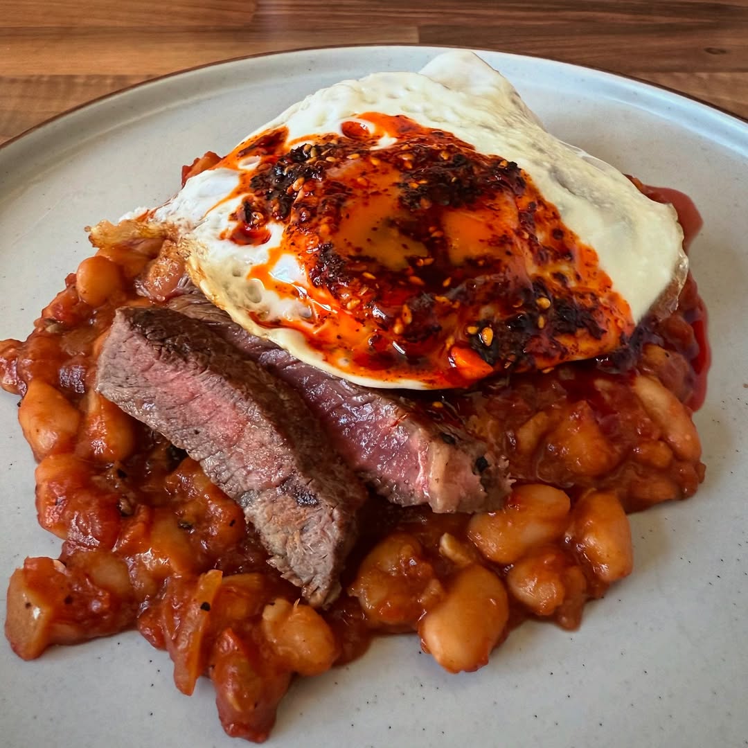 BBQ White Beans with Rare Sirloin & Crispy Egg